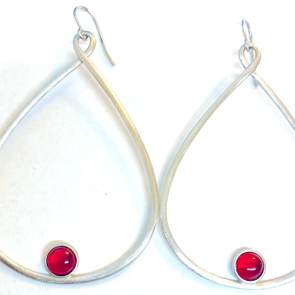 Andrew Hamilton Crawford silver earrings.